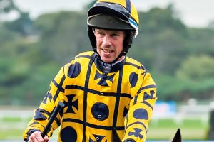 Jockey Johnny Allen, above, was aboard Etana for her win in The Roses at Doomben. Photo by Race Horse Photos Australia. 
