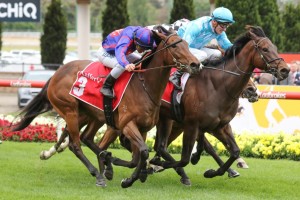 Fascino, in aqua colours, and La Falaise, in blue and red, dead heat in the Fillies Classic at The Valley.